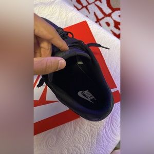 nike low dunk black canvas